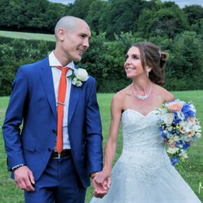 Monkton Barn Wedding Photography - the newlyweds take a stroll in the grounds
