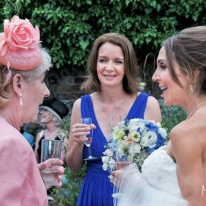 Monkton Barn Wedding Photography - candid moments during the drinks reception