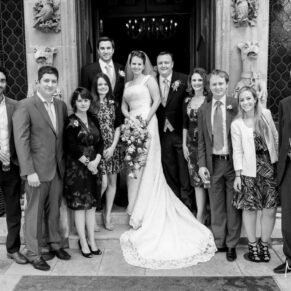 Odney Club Wedding Photography - formal group pose captured at the main entrance