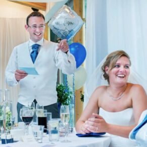 Odney Club Wedding Photography - the newlyweds captured during the speeches