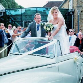Odney Club Wedding Photography - the couple's car was pushed the last 200 metres to the reception after a motor breakdown