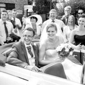 Odney Club Wedding Photography - the newlyweds inside their wedding vintage car
