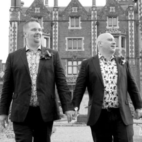 Same Sex Buckinghamshire Wedding Photography - the grooms take a stroll at their reception venue