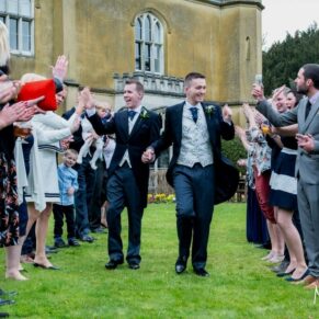 Same Sex Buckinghamshire Wedding Photography - the grooms walk through their confetti aisle