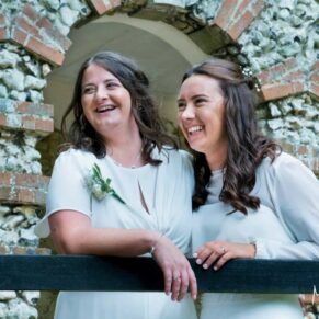 Same Sex Buckinghamshire Wedding Photography - a relaxed pose from these two smiling brides