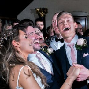 The energetic newlyweds captured dancing the night away with their friends at The Dairy on the Waddesdon Estate