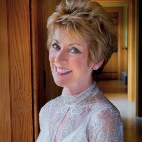 The Dairy - Waddesdon - Buckinghamshire Wedding Photographer - the bride poses for the camera before her ceremony