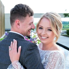 Five Arrows Hotel - Buckinghamshire Wedding Photographer - the bride and groom pose for my camera at Windmill Hill