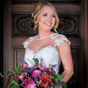 Five Arrows Hotel - Buckinghamshire Wedding Photographer - the main doorway at Waddesdon Manor provides a perfect backdrop for this bridal portrait
