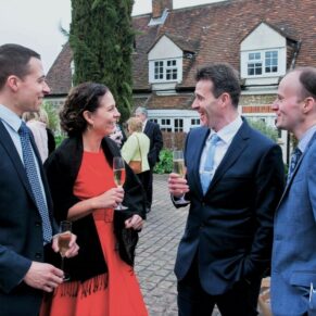 Old Luxters Wedding Photography - guests relaxing during the drinks reception