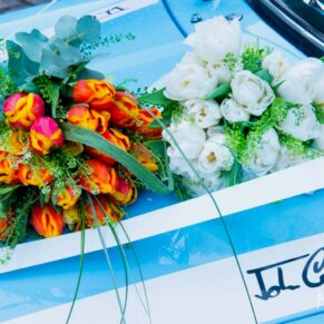Old Luxters Wedding Photography - Old Luxters Wedding Photography - gorgeous bouquets placed on the bonnet of the brides vintage car