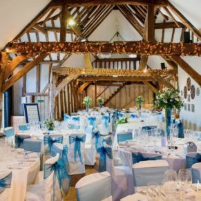 Old Luxters Wedding Photography - the stunning historic interior all setup for the meal