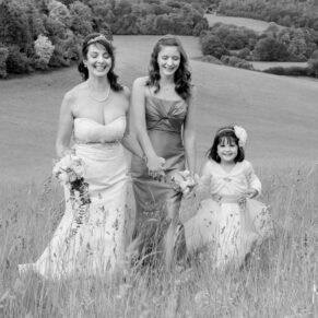 Old Luxters Wedding Photography - the bridesmaids join the bride for a stroll in a nearby meadow