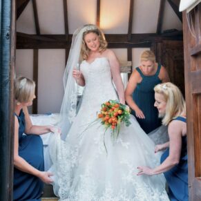 Old Luxters Wedding Photography - final adjustments for the bride pre ceremony