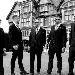 The lads strike a pose at the front of Pendley Manor Hotel prior to the civil wedding ceremony