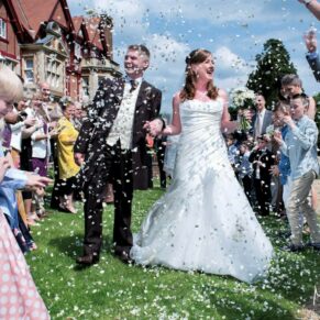 Colourful wedding confetti aisles always add so much fun to the proceedings at Pendley Manor
