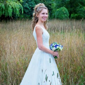 Runnymede Hotel Wedding Photography - bride relaxing in the tall grasses