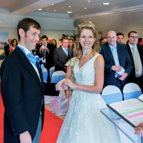 Runnymede Hotel Wedding Photography - a natural shot of the newlyweds taken during the civil ceremony