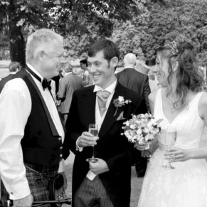 Runnymede Hotel Wedding Photography - candid moment during the drinks reception