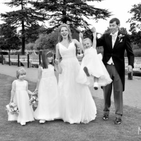 Runnymede Hotel Wedding Photography - the newlyweds take a stroll with their flower girls