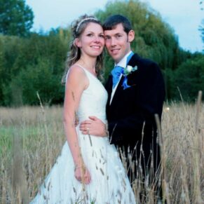 Runnymede Hotel Wedding Photography - the bride and groom in the hotel's grass meadow