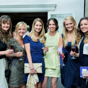 Sir Christopher Wren Hotel Wedding Photography - a group of ladies posing for picture before the meal