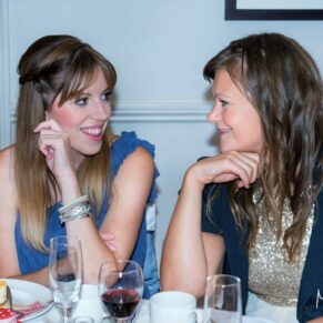 Sir Christopher Wren Hotel Wedding Photography - two ladies enjoying a giggle during the meal