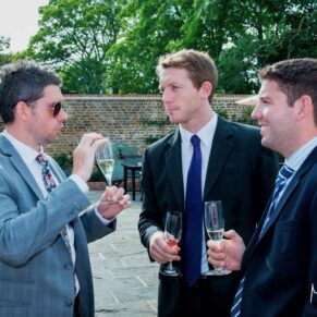 Sir Christopher Wren Hotel Wedding Photography - candid moment during the drinks reception