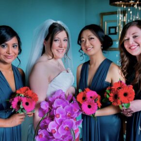 Stoke Place wedding photography - the bride with her bridesmaids pose for the camera
