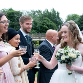 Swan at Streatley wedding photography - candid moments on the hotel lawns