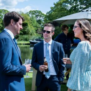 Swan at Streatley wedding photography - candid moment capturing the guests during the drinks reception