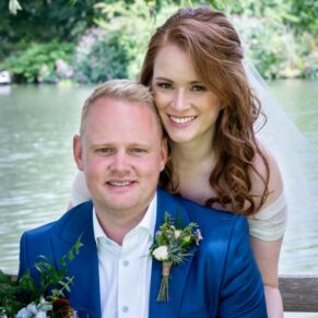 Photography of the newlyweds captured beside the River Thames at their Swan at Streatley wedding