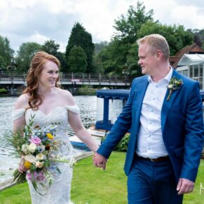 Swan at Streatley wedding - the newlyweds take a stroll beside the River Thames on their special day