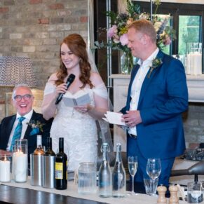 Fun and laughter during the speeches makes for great photography during this Swan at Streatley Hotel wedding