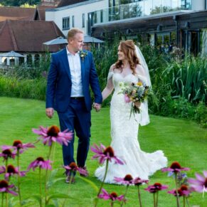 The Swan at Streatley - the newlyweds take a stroll in the colourful gardens of the hotel