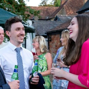 Reportage shots of the guests during the drinks reception in the gardens