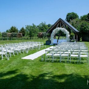 All setup for the outdoor summer ceremony at the Tudor Barn in the Chilterns