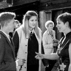 Guests catching on the gossip during the drinks reception