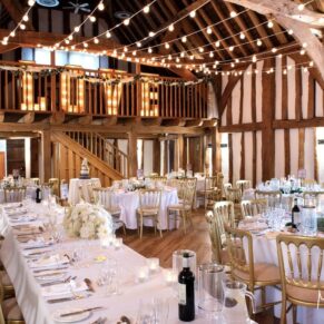 Striking interiors inside the historic Tudor Barn for the wedding breakfast