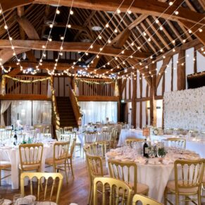 The grand Tudor Barn interior all set for the wedding breakfast