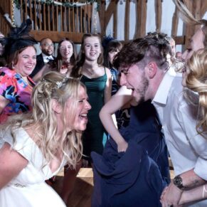 The bride dancing the night away with her son at the Tudor Barn