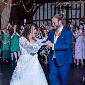 Cameras at the ready for the newlyweds first dance at their Olde Bell in Hurley wedding reception