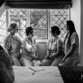 The ladies captured in silhouette sat in a feature window in the bridal suite