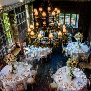 Wide view from above of The Great Hall at Weston Manor Hotel in all its glory lit by atmospheric window lighting