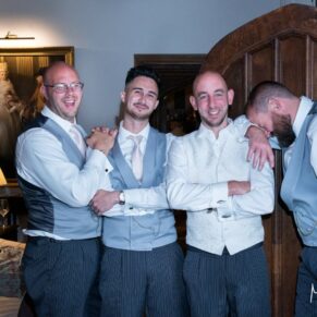The lads having a giggle at the bar inside this grand hotel