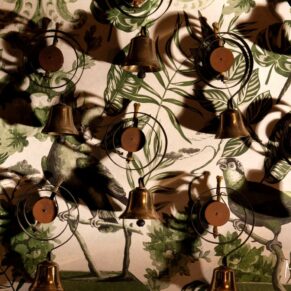 The Castle Hotel's servants bells behind reception are dramatically lit for this shot