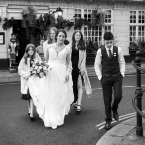 The bride with her entourage leaves the hotel on route to the Guildhall for her civil marriage ceremony