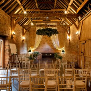 The atmospheric barn interior all setup for the civil ceremony