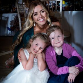 Cuddles all around for these three ladies during the evening's entertainment in the tipi