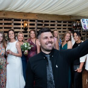 Selfie time for these fun loving ladies and male friend during the drinks reception